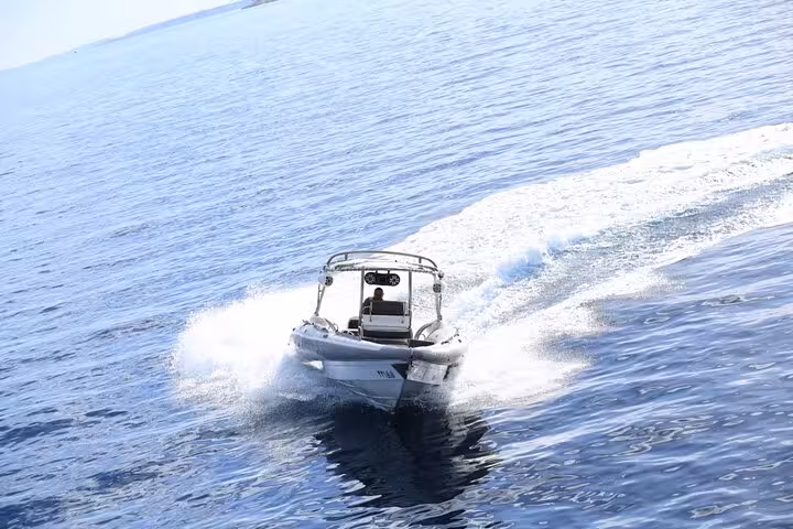 Fast speedboat cutting through Sharm El Sheikh waters, ideal for a 2-hour Red Sea speed boat trip experience