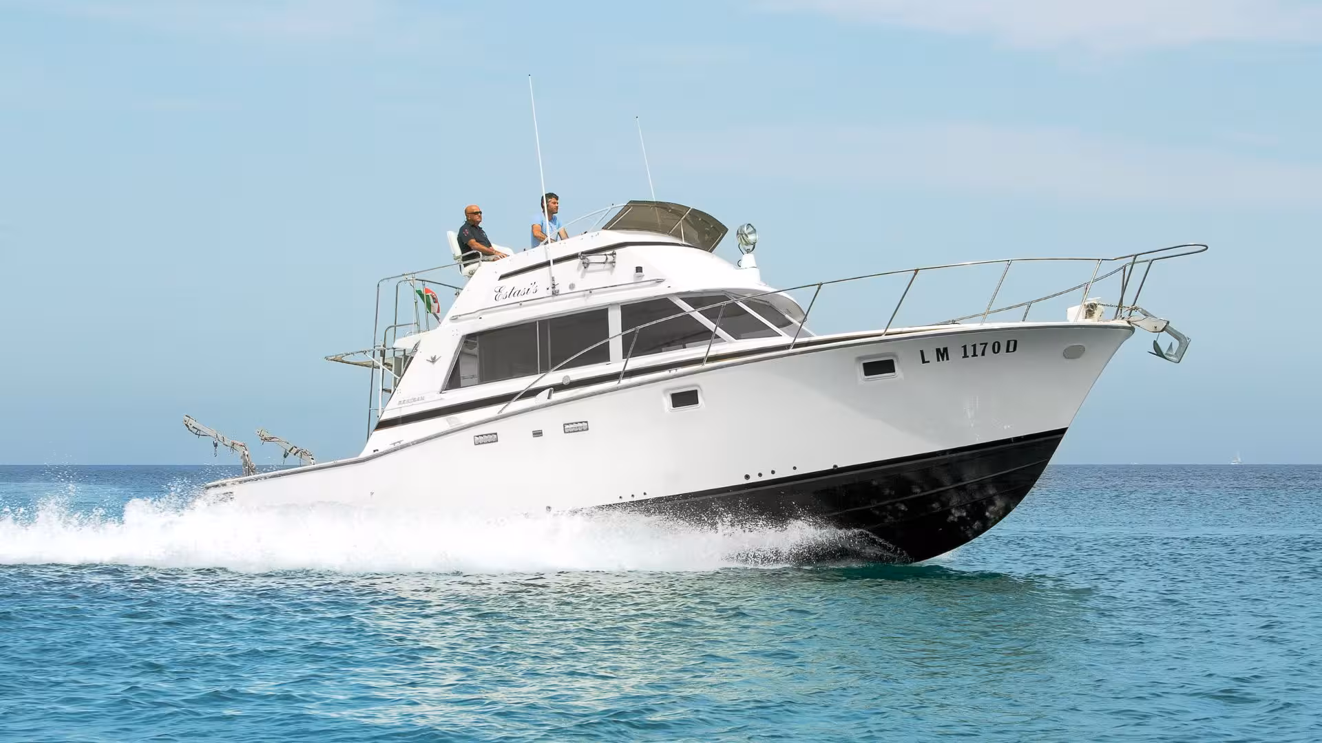 Experience a thrilling speedboat tour from Santa Teresa di Gallura to southern Corsica on a sleek, modern vessel.