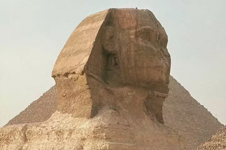 Great Sphinx with Giza Pyramid backdrop on Cairo excursion from Port Said, classic Pyramids and Sphinx tour photo