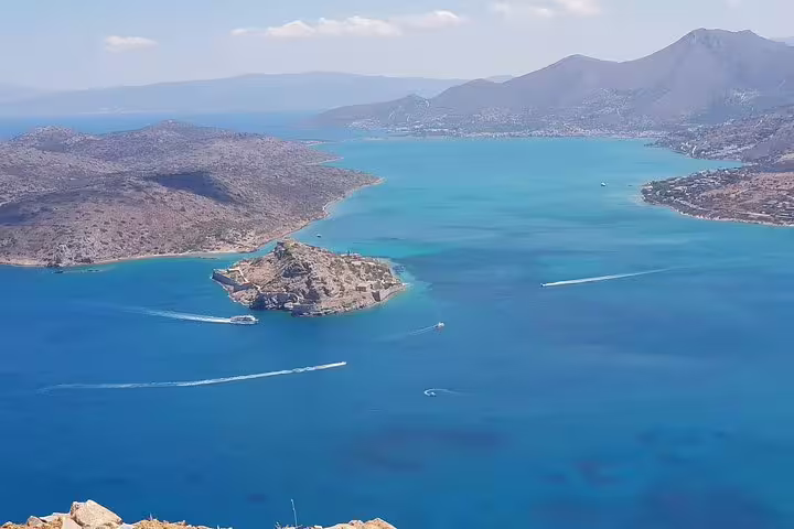 Aerial view of Island Spinalonga surrounded by turquoise waters, ideal for private speedboat tours in Crete.