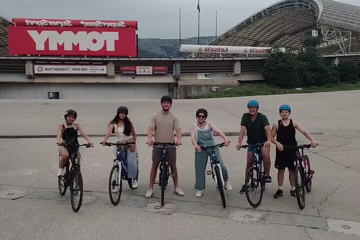 Split City Bike Tour group with bicycles at Poljud Stadium, guided cycling sightseeing in Split Croatia