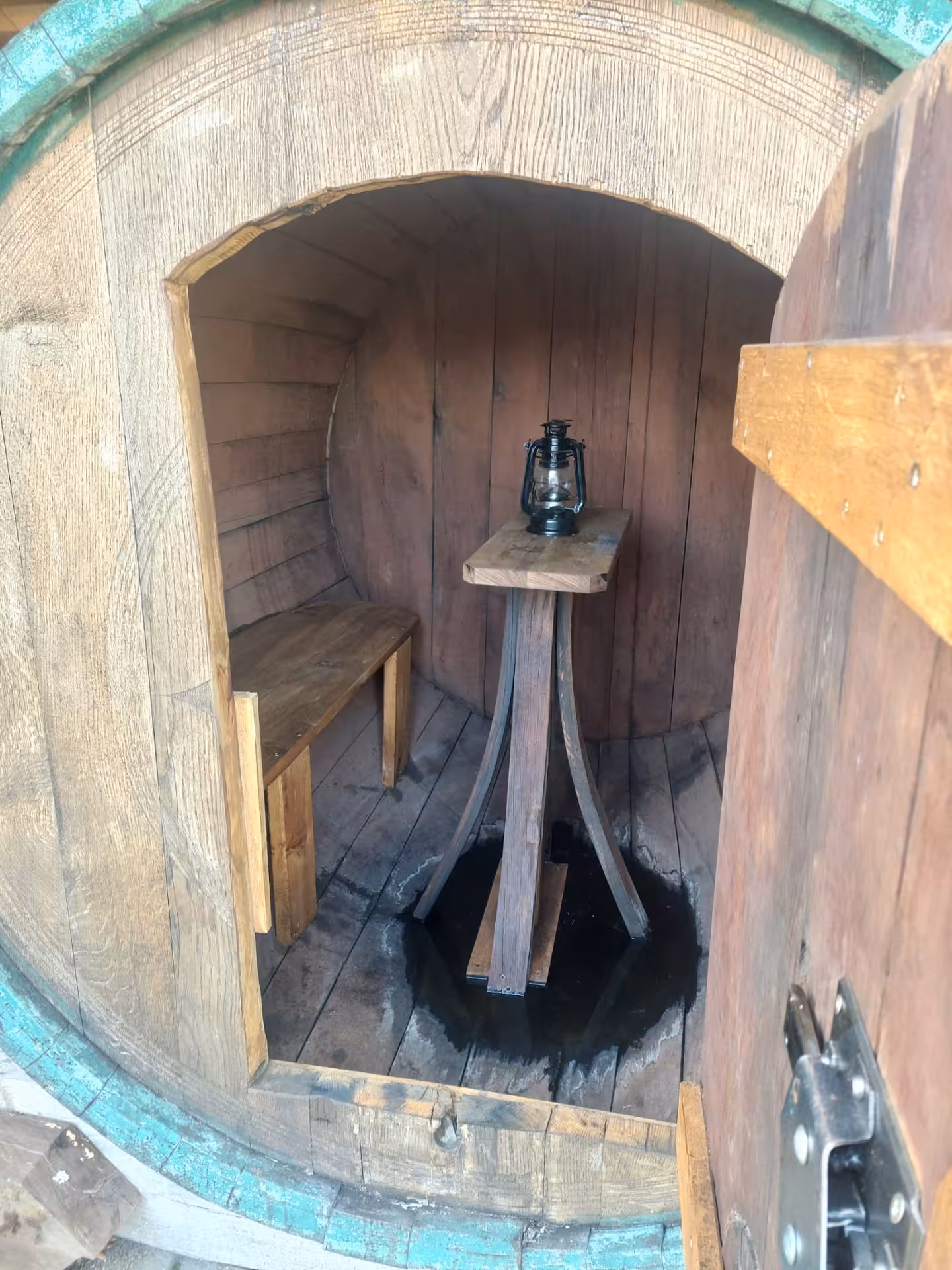 Inside a rustic wine barrel tasting room near Split, ideal for Imotski Lakes wine and dine tour