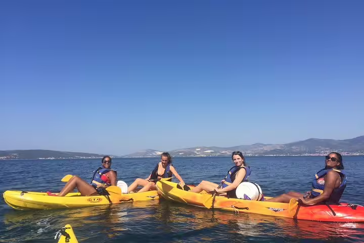 Group sea kayaking in Split on calm Adriatic waters, guided tour with snorkeling stops and coastal views