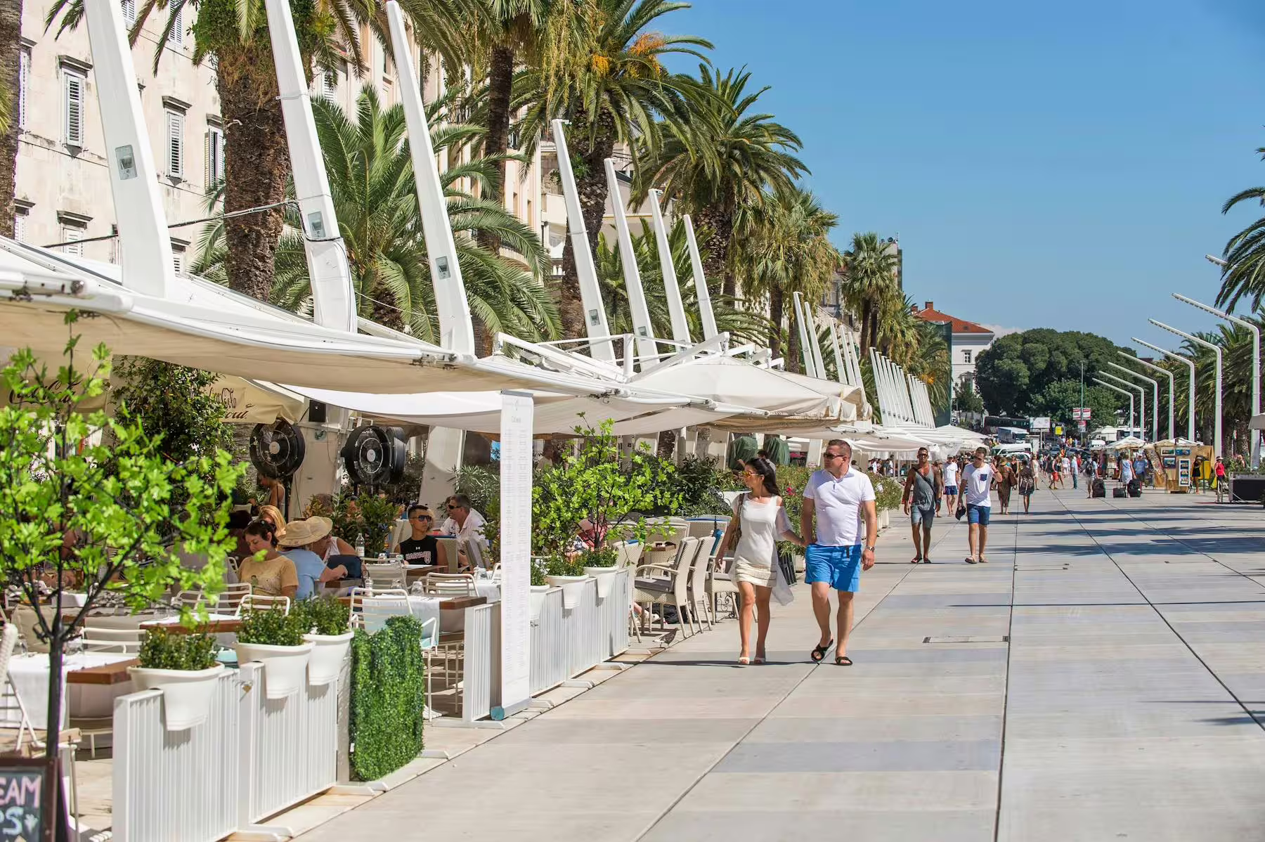 Split seaside promenade cafes and palm-lined Riva, part of Trogir and Split day tour from Makarska Riviera