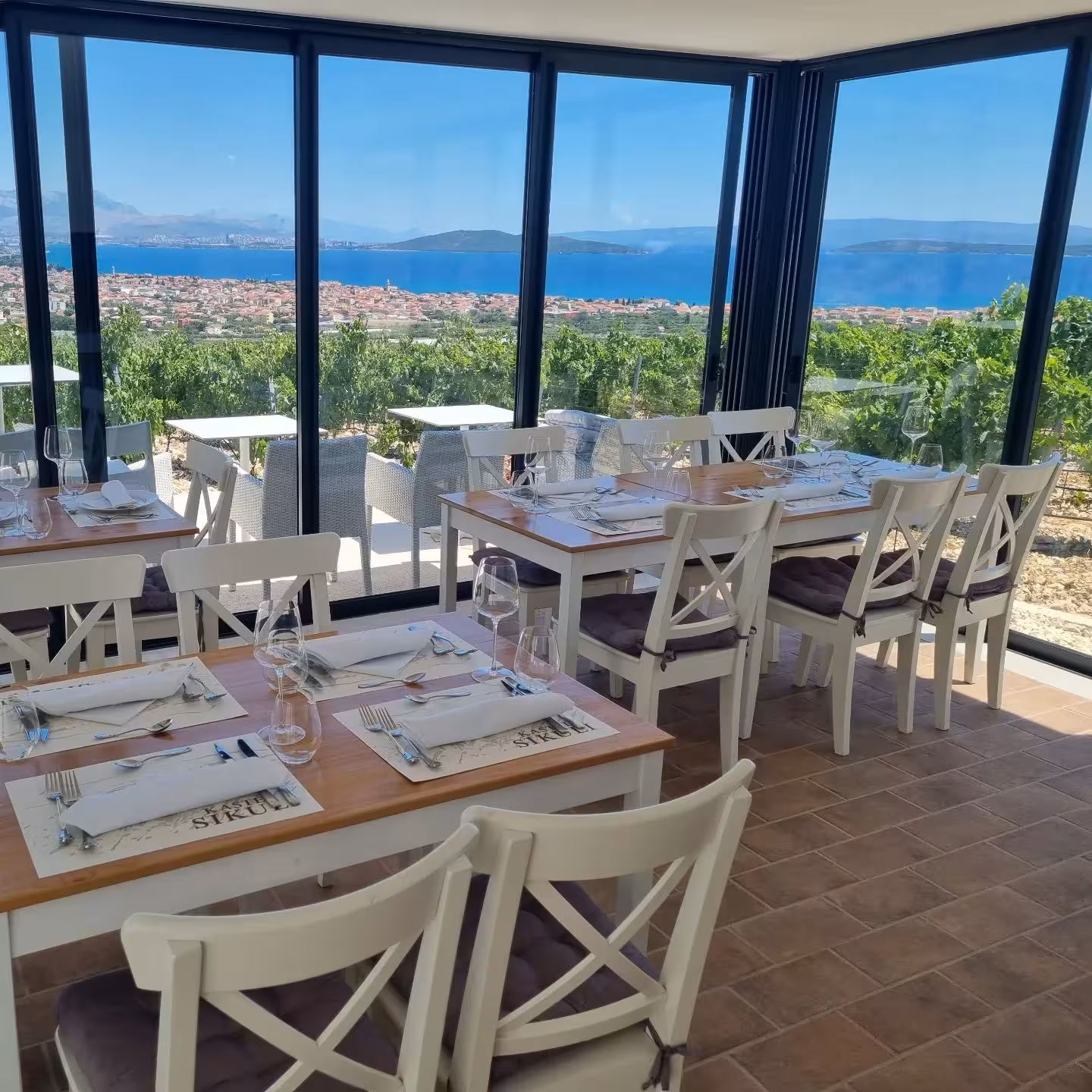 Vineyard restaurant near Split with sea-view dining setup, ideal for The Taste of Dalmatia wine & dine tour