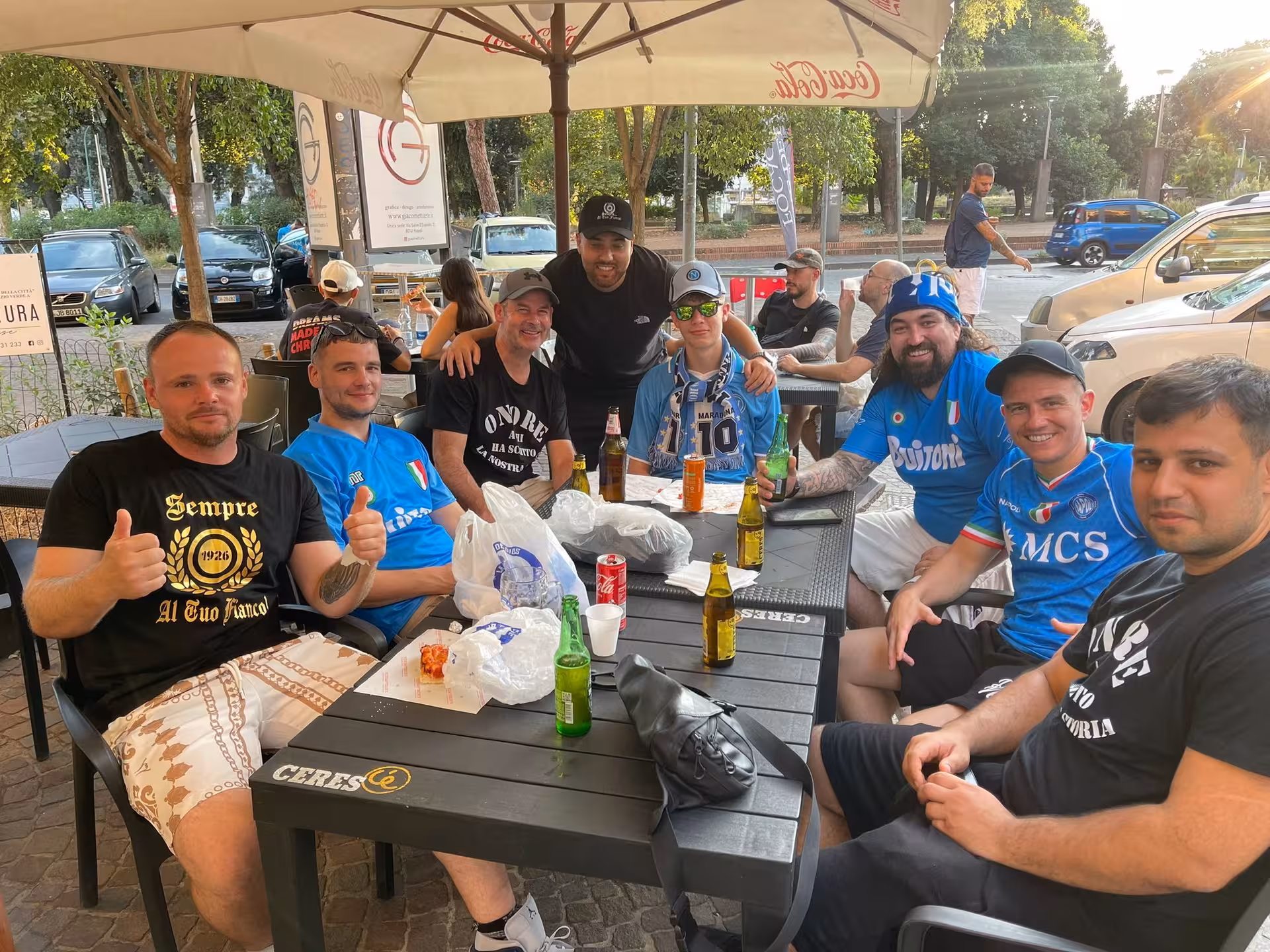 SSC Napoli fans meet at Naples bar before the match, enjoying drinks with a local host game day experience
