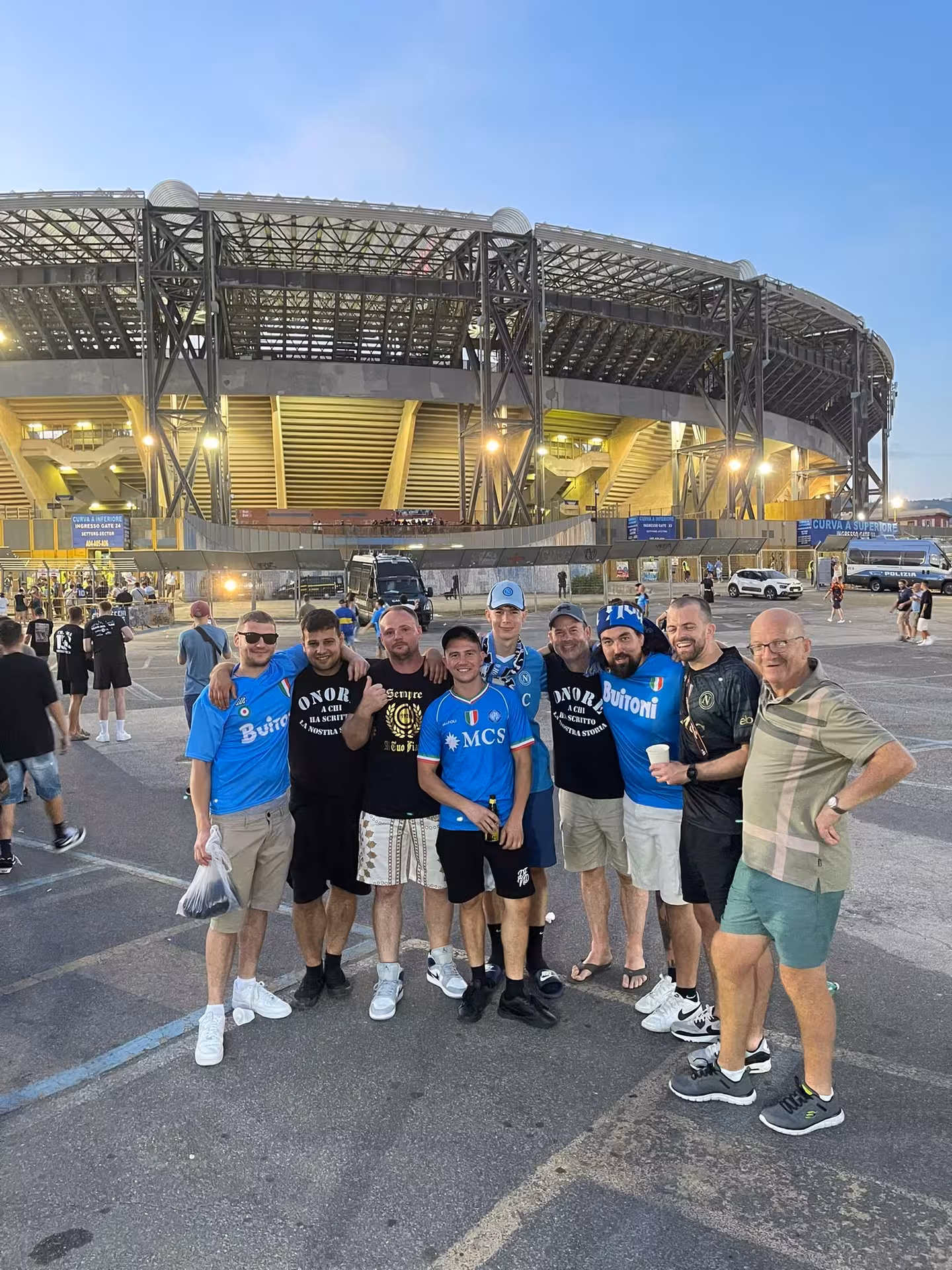 Group of SSC Napoli supporters outside Diego Armando Maradona Stadium in Naples, pre-game local fan tour