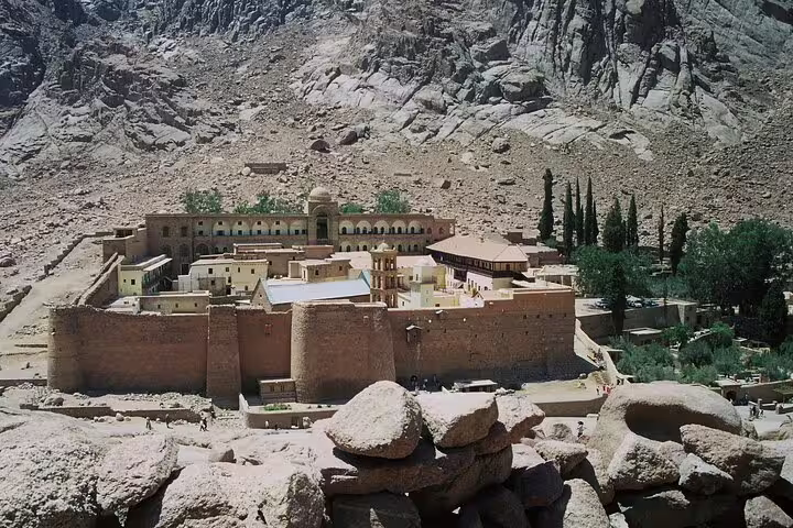 St. Catherine Monastery at Mount Sinai, Egypt, seen from rocky slopes on Moses’ Mountain tour