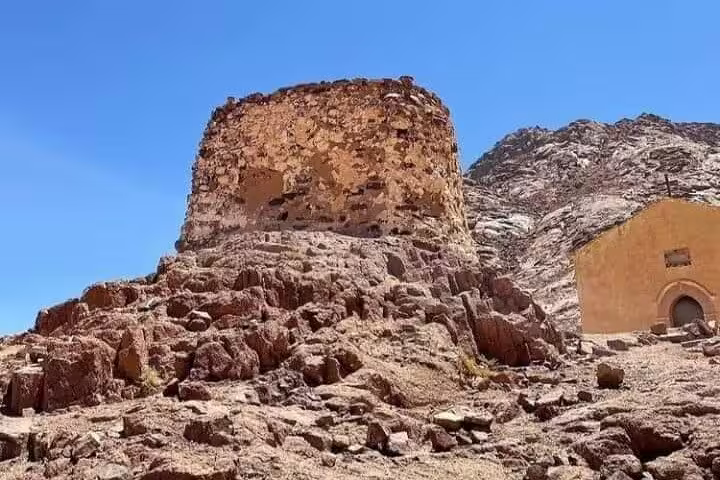 Ancient stone tower near St Catherine Monastery on Mount Sinai climb day trip from Sharm El Sheikh