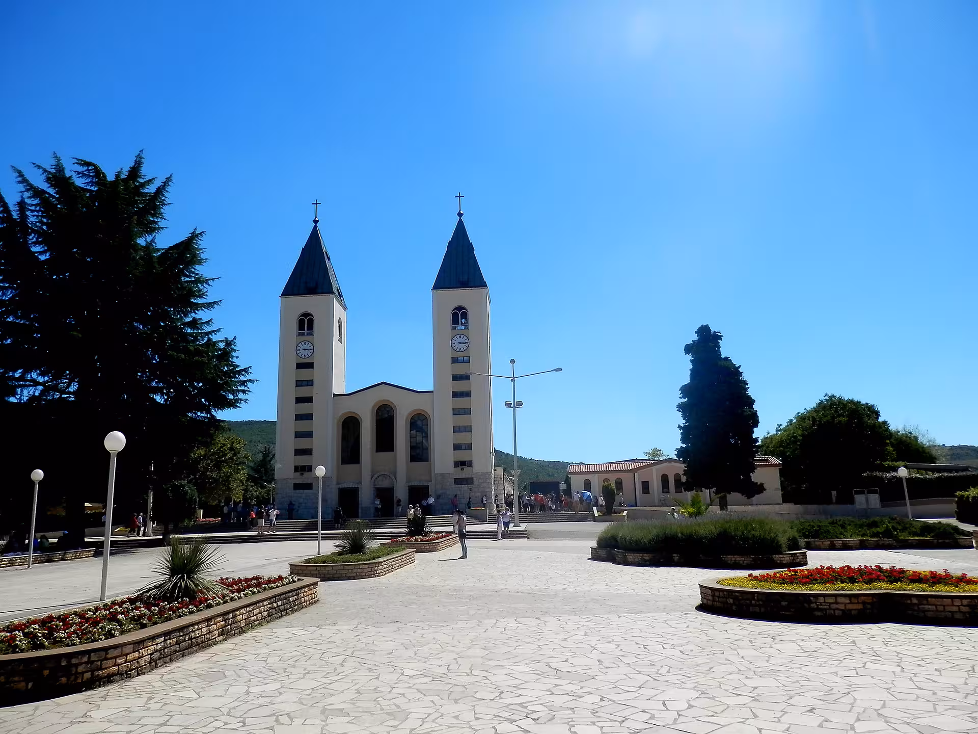 St James Church in Medjugorje square, key stop on Medjugorje Special from Split day trip to Bosnia