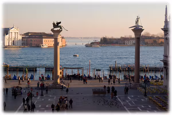 View from St Mark’s Square over the waterfront and columns of San Marco, a highlight stop on the 3 hours Venice walking tour