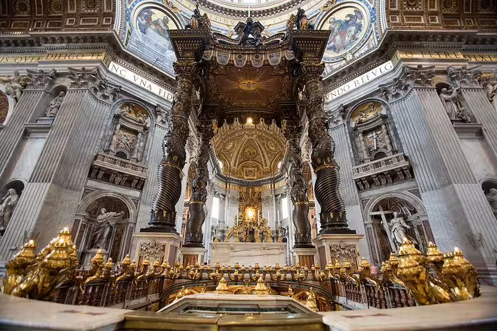 Close-up of St Peter’s Basilica ornate altar and baldachin, visited on Vatican Museums and Sistine Chapel guided group tours in Rome