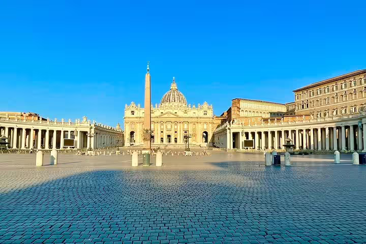 Early morning view of St Peter's Basilica and empty St Peter's Square before a VIP dome climb private tour in Vatican City