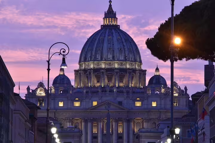 St Peters Basilica dome at sunset in Vatican City, must-see Rome highlight on an exclusive guided tour