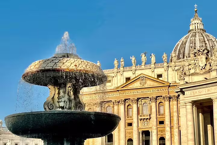 St Peter’s Basilica and ornate fountain in Vatican City on a fast track Colosseum and Vatican Museums guided tour