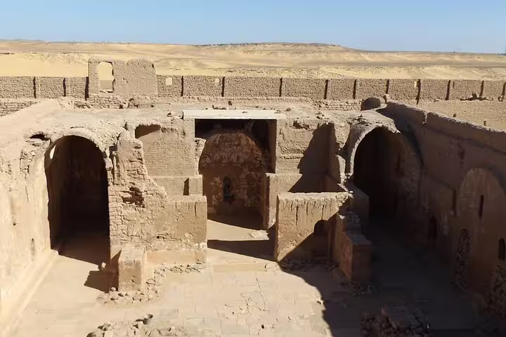 Ancient mud-brick chambers at St. Simeon Monastery, Aswan desert, on guided Nubian heritage tour