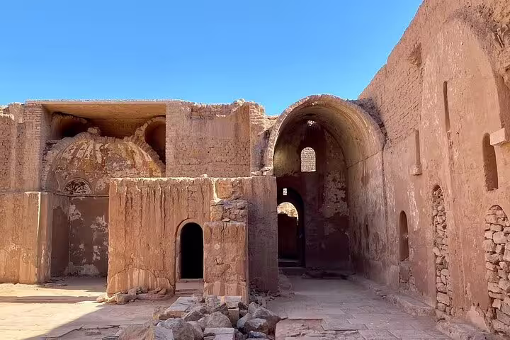 Ruins and arches inside St. Simeon Monastery in Aswan, Egypt, a historic Nubian desert monastery tour stop