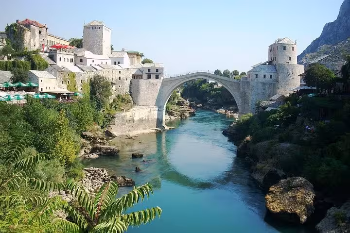 Stari Most bridge over Neretva River in Mostar, Bosnia, scenic stop on Croatia Slovenia Montenegro tour