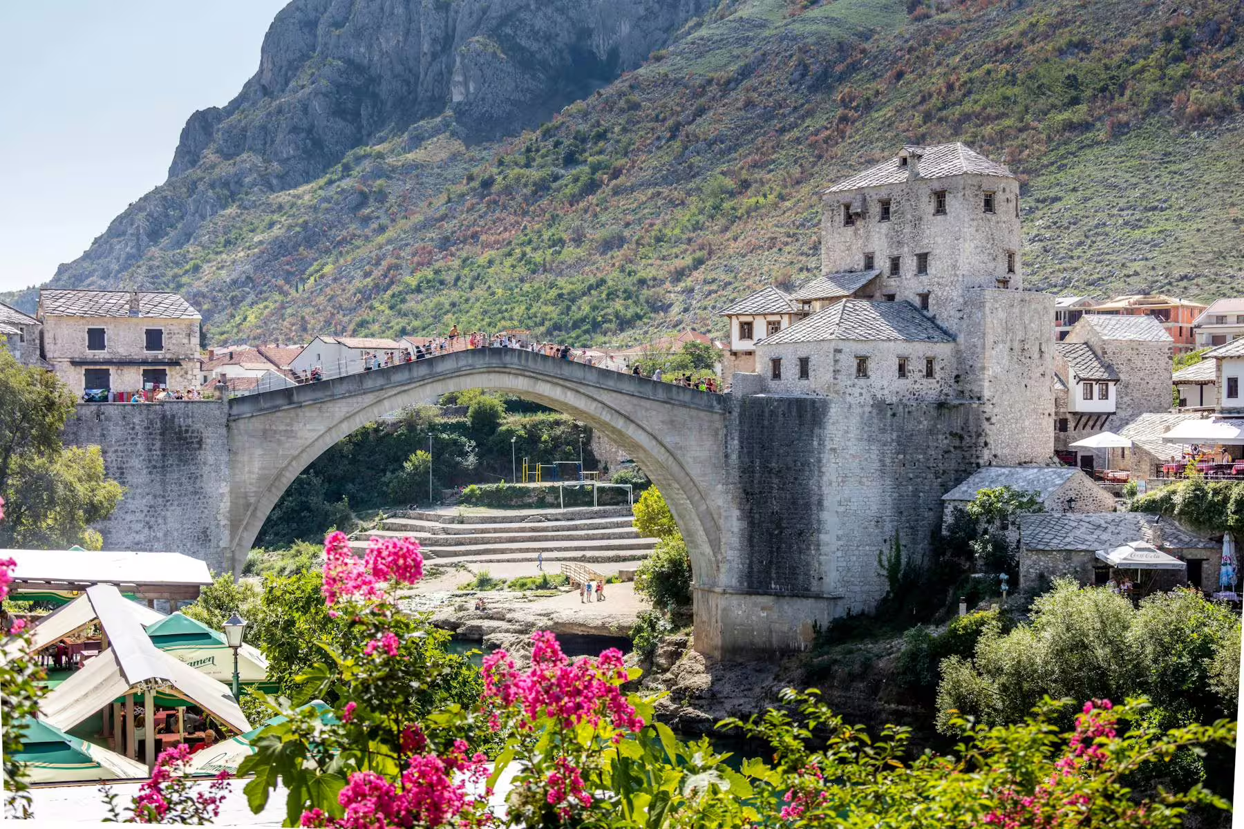 Stari Most bridge in Mostar Old Town on a day trip from Makarska Riviera, with Neretva River views