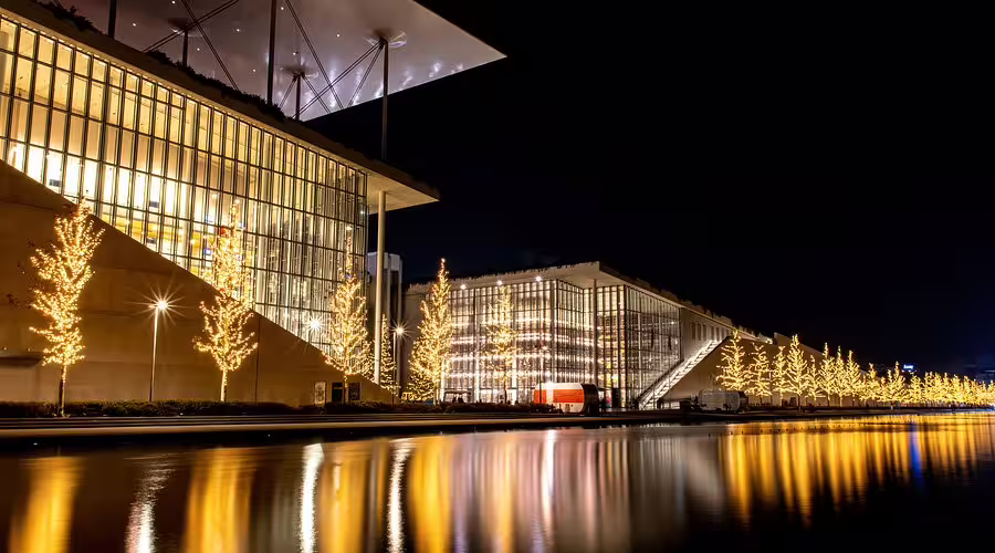 Stavros Niarchos Foundation Cultural Center at night, modern Athens sightseeing on private panorama and Cape Sounio tour