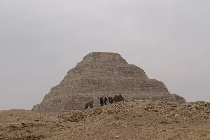 Step Pyramid of Djoser at Saqqara with visitors on Saqqara and Dahshur pyramids and Memphis tour with lunch