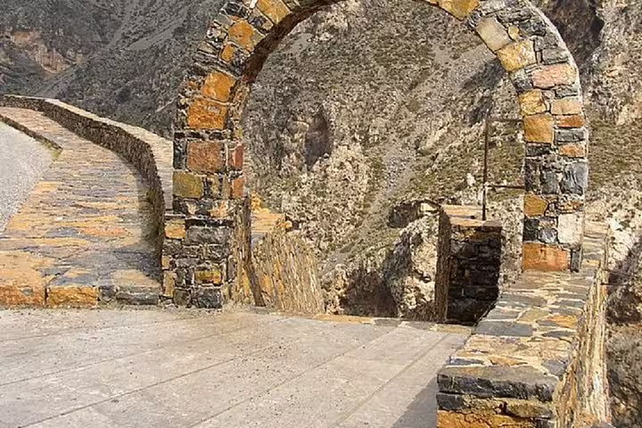 Stone arch on scenic mountain road in Crete, stop on Preveli Palm Beach day trip from Rethymno