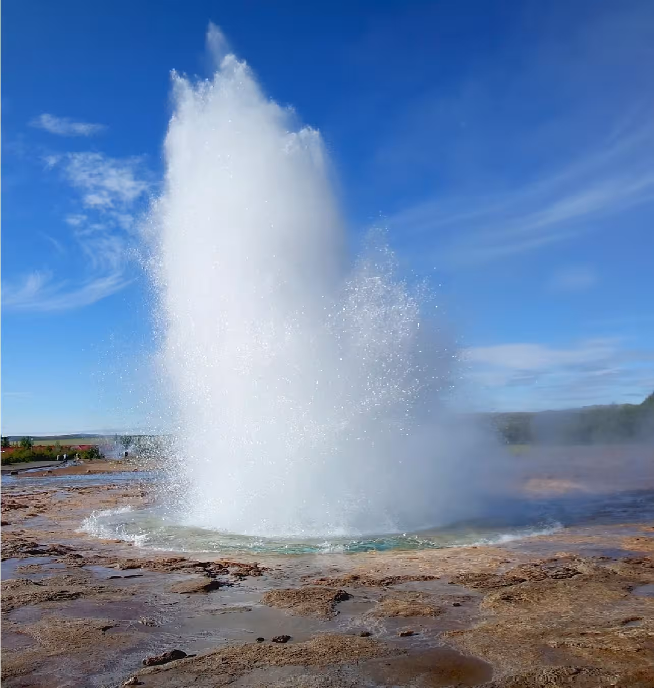 Strokkur geyser erupting in Haukadalur on Iceland Golden Circle Rally Car Experience adventure tour