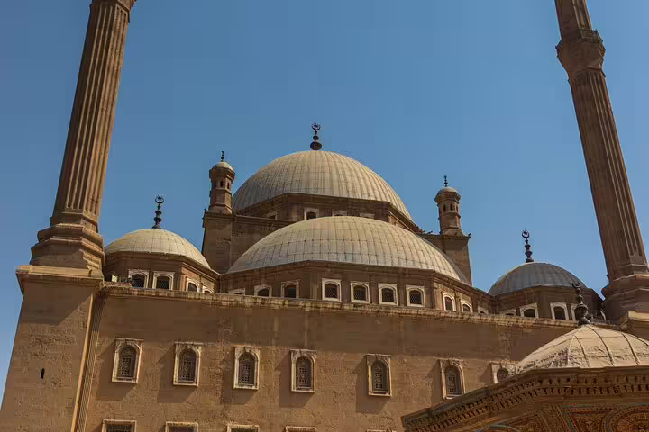 Domes and minarets of Sultan Hassan Mosque at Cairo Citadel, highlight of Citadel and mosques tour