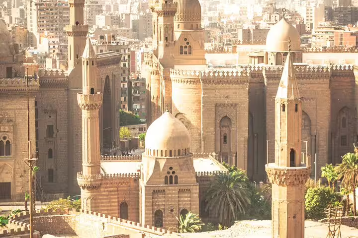 Skyline view of Sultan Hassan Mosque and domes in Islamic Cairo, stop on historical Cairo mosques tour