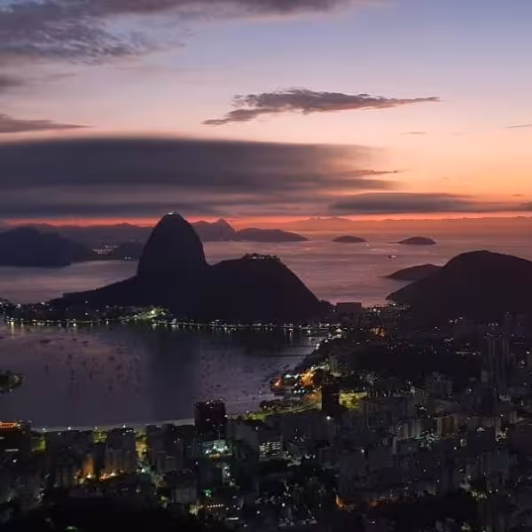Breathtaking sunrise view over Sugarloaf Mountain from Dona Marta Viewpoint, perfect for a private experience booking.