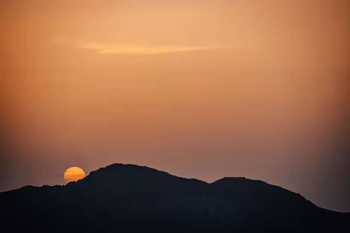 Sunrise over Moses Mountain in Sinai, Egypt, on a private tour from Taba to St Catherine Monastery