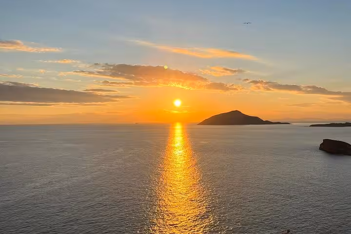 Golden sunset over the Aegean Sea from Cape Sounion viewpoint on a private luxury Athens Riviera trip