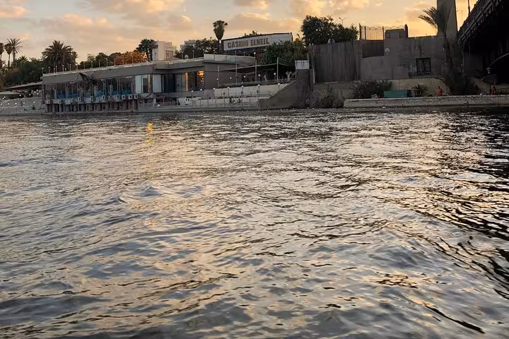 Sunset view on the Nile River in Cairo, ideal felucca sailing stop on a private Giza Pyramids day tour