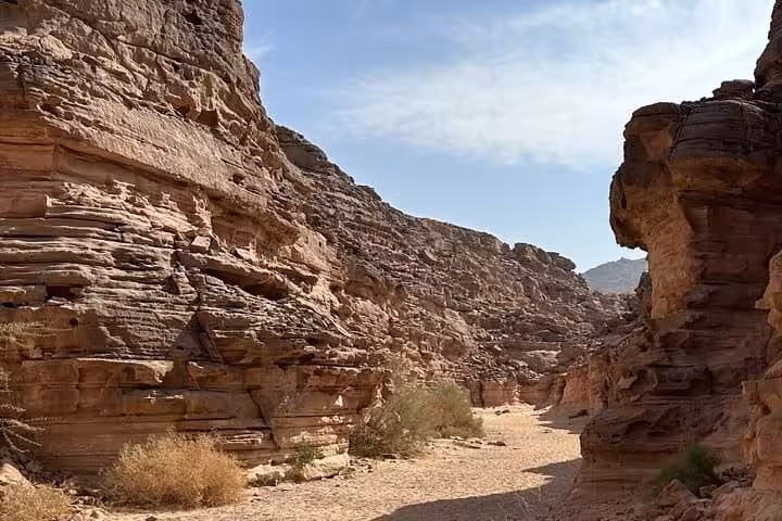 Narrow rocky passage in Super Colored Canyon, part of Sharm El Sheikh jeep adventure to the Blue Hole