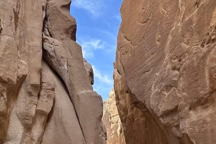 Narrow sandstone gorge walls in Super Colored Canyon, highlight of Sharm El Sheikh jeep adventure to Blue Hole