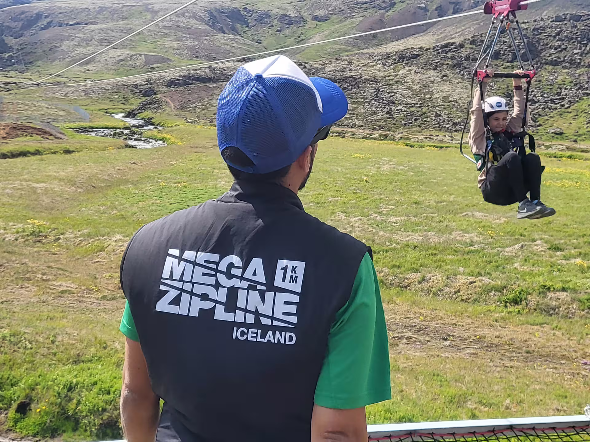 Thrill-seeker enjoys the Superman Ride zipline experience in scenic Iceland, guided by Mega Zipline's expert team.