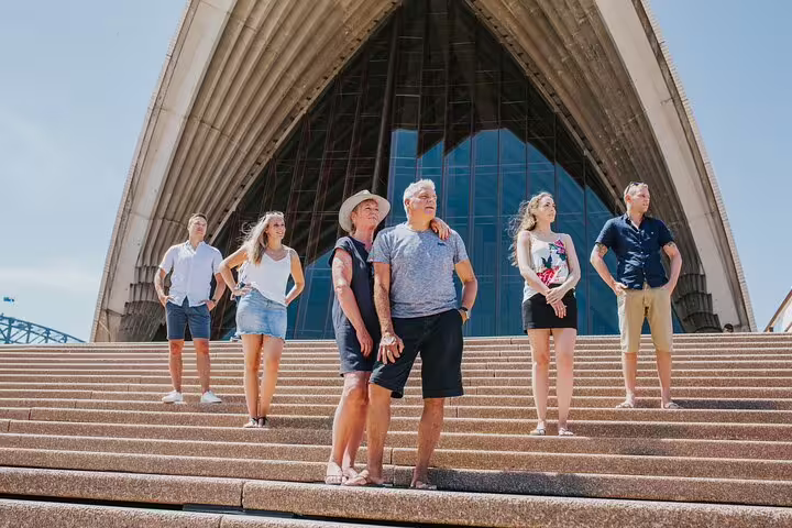 Group portrait on Sydney Opera House steps during private travel photographer tour, iconic Sydney photo spot