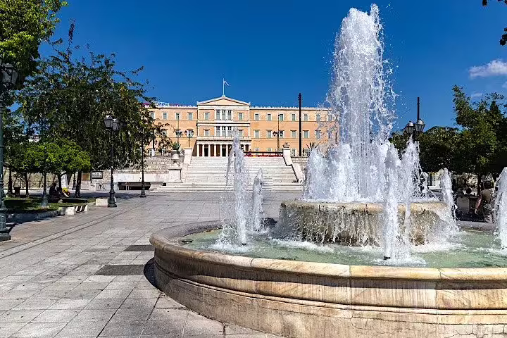 Syntagma Square fountain facing the Hellenic Parliament, a key stop on an Athens highlights private half-day tour