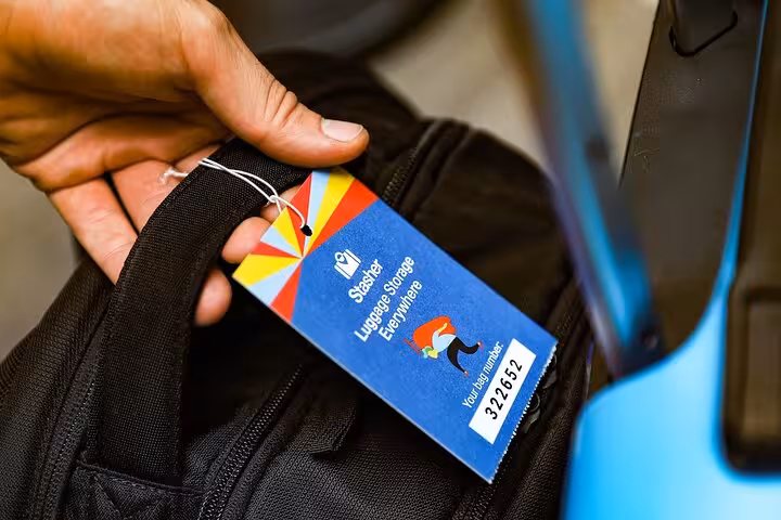 Close-up of tagged backpack for secure Bali luggage storage near Ubud Market, convenient bag drop service