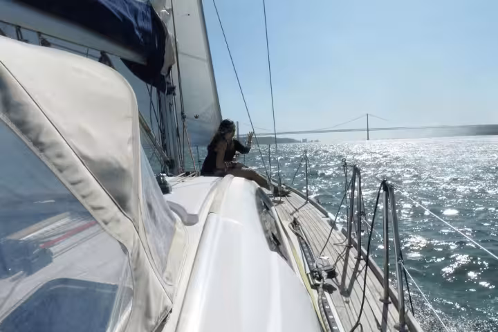 Enjoy a scenic day sailing tour on the Tagus River from Lisbon with stunning views of the iconic 25 de Abril Bridge.