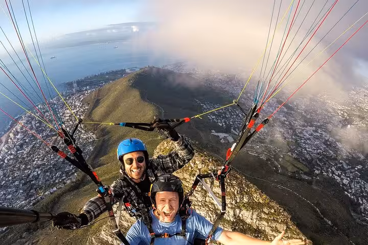 Enjoy an exhilarating tandem paragliding adventure over Cape Town, with panoramic views of the coastline and Table Mountain.