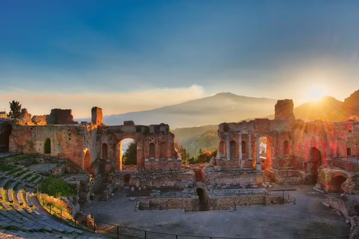 Ancient Greek Theatre of Taormina at sunset with Mount Etna views, Sicily tour from Palermo and Godfather sites