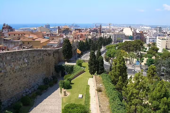 Panoramic view from Tarragona city walls over gardens and the port, a key highlight on the self-guided scavenger hunt