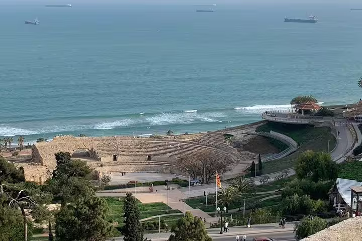 Explore Tarragona's ancient Roman amphitheater with stunning Mediterranean Sea views on our captivating city tour.