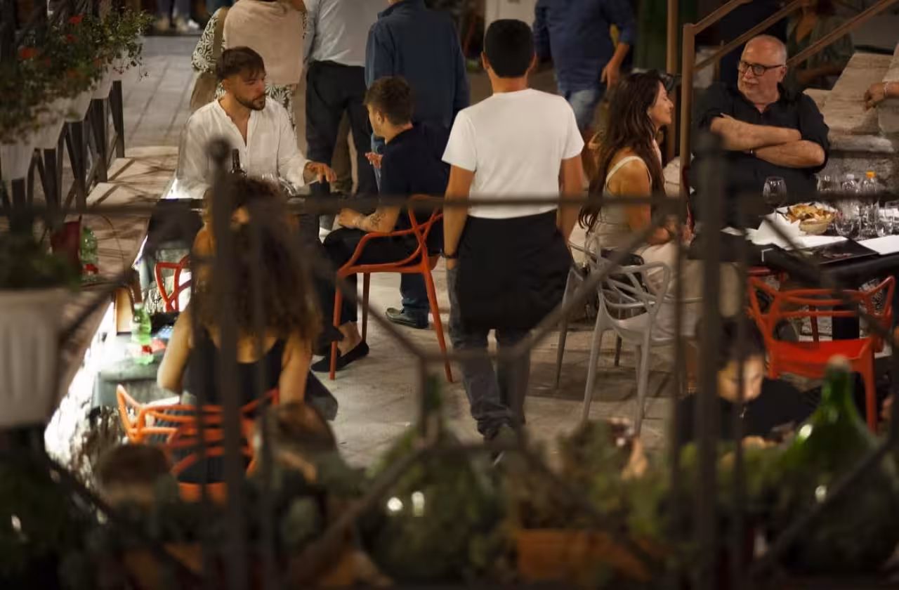 Lively evening aperitivo with local bites and wine, part of the Taurasi light tasting food and wine tour