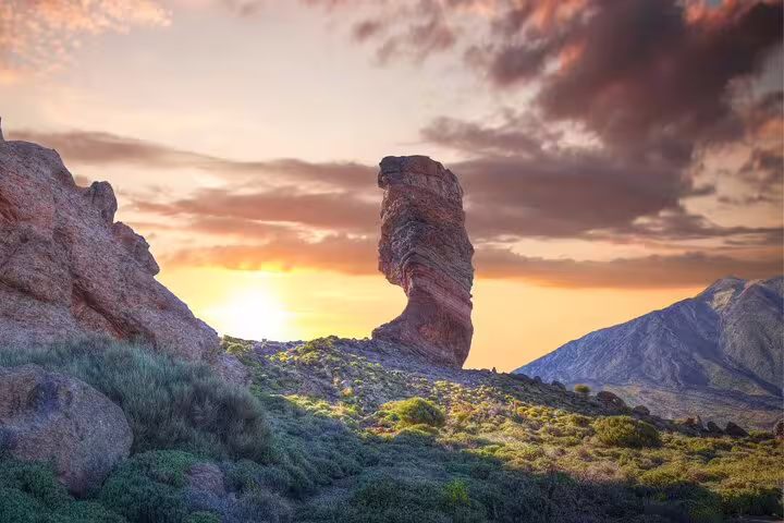 Majestic sunset view at Teide National Park with unique rock formations and colorful skies.