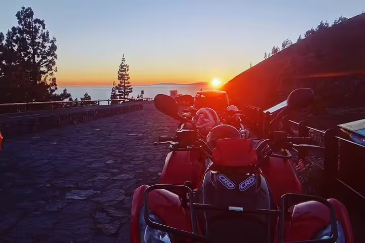 Sunset view on a quad bike road trip with Teide in the background, perfect for adventure seekers.