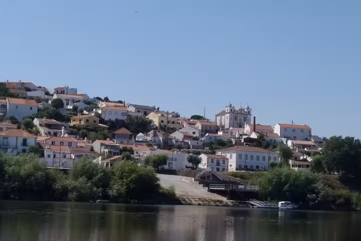 Scenic view of a historic village near Almourol Castle, part of the immersive Templars private tour experience.