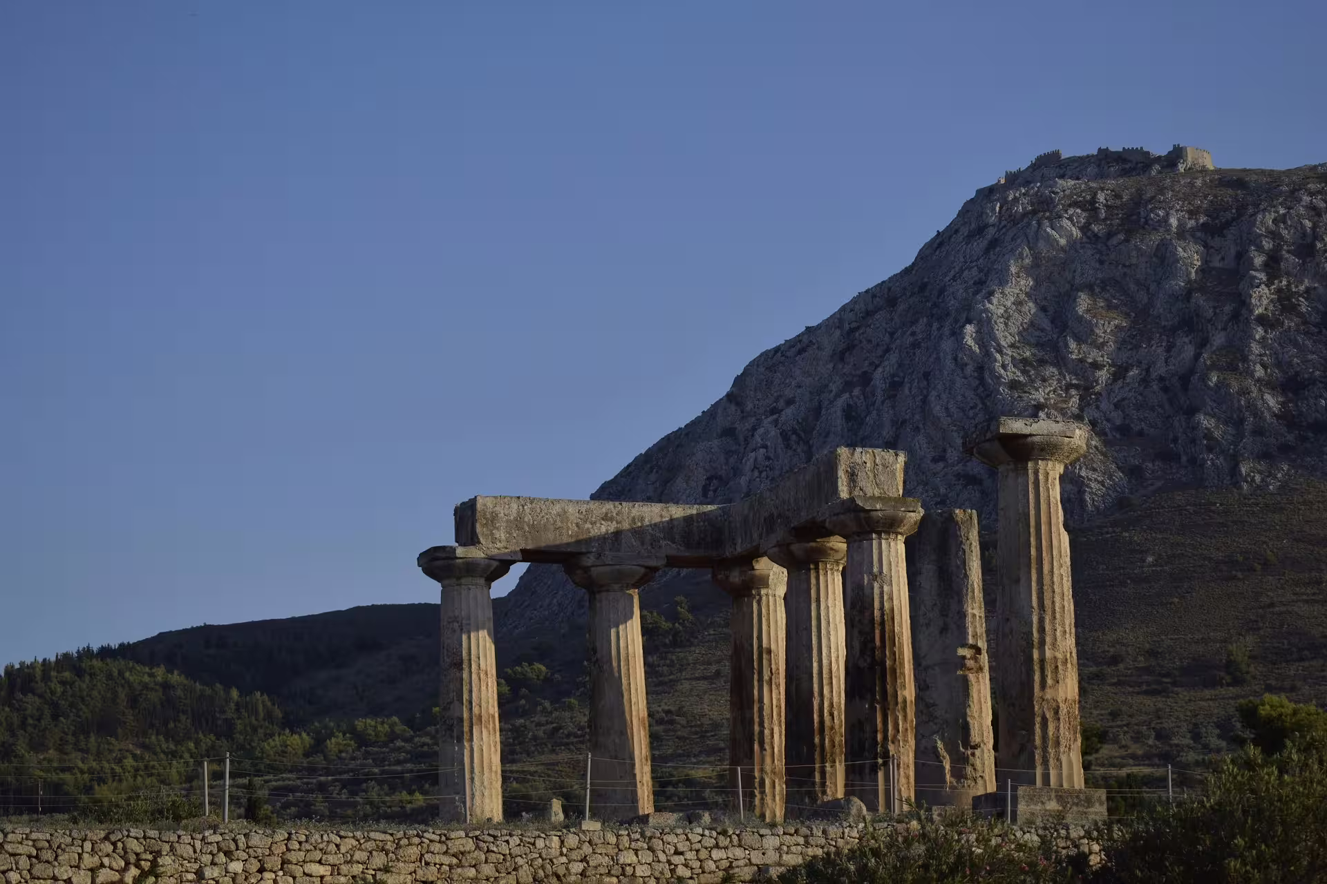 Temple of Apollo columns at Ancient Corinth on a private day tour from Athens with Isthmus Canal stop