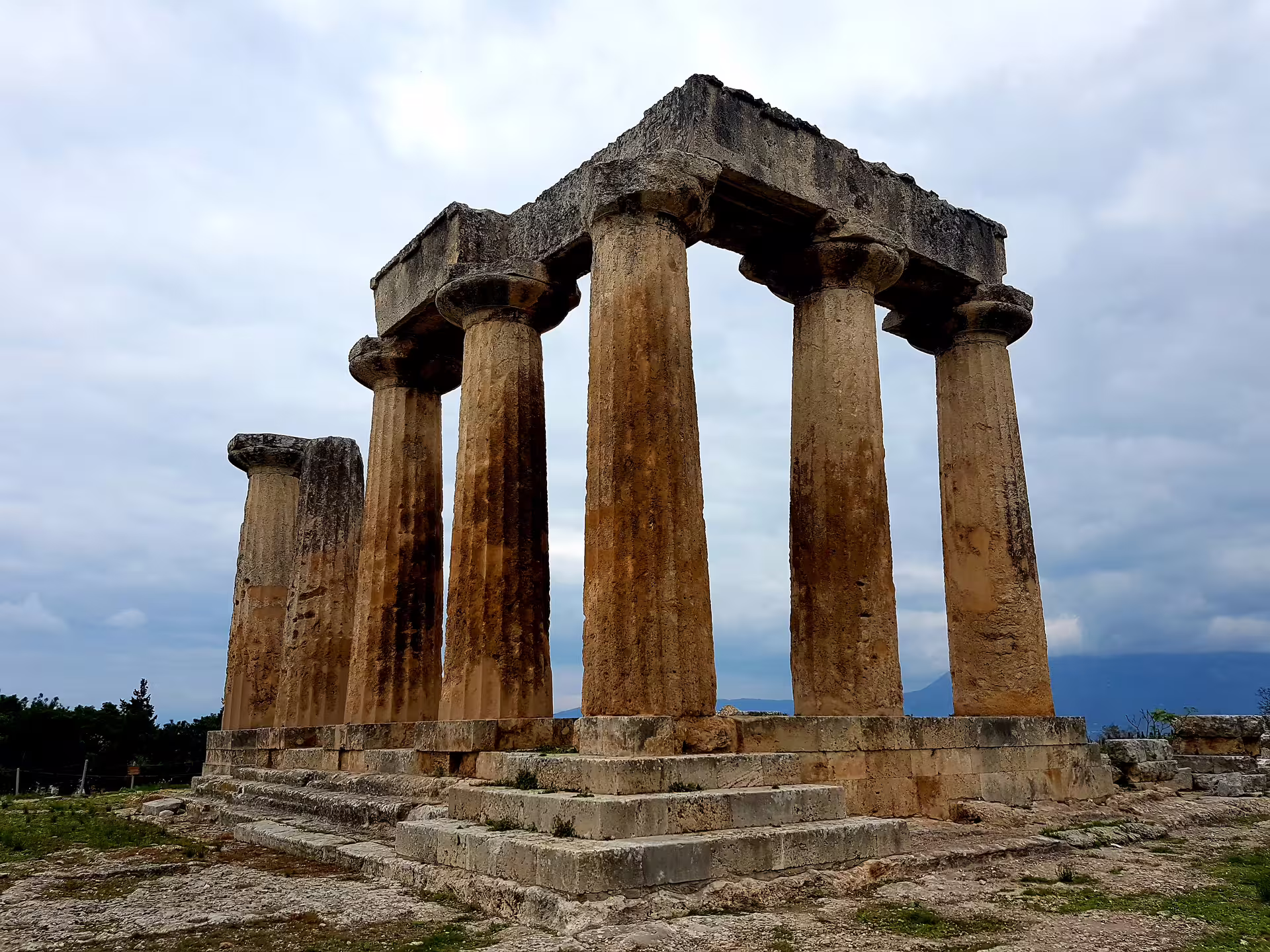 Close-up of the Temple of Apollo columns at Ancient Corinth, a highlight on private Athens day tour to Epidaurus